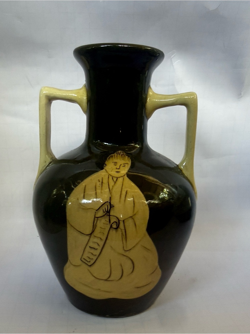 Ceramic Two-Handled green and Cream Decorative Vase with Figure